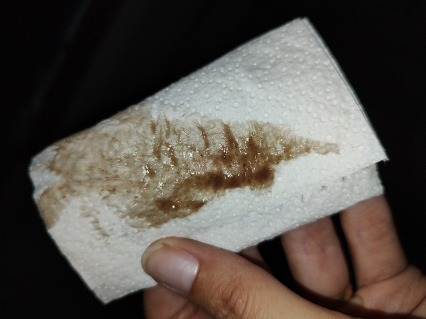 Bruine afscheiding  